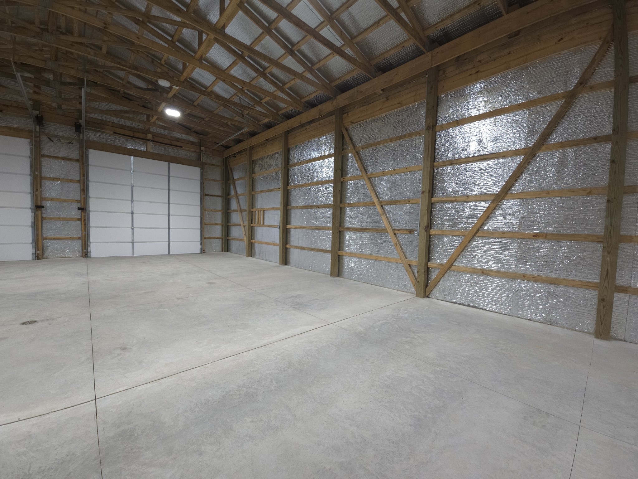 1116 Maxwell Branch Road Cottontown, TN 37048 - Photo 44 of 57 a view of an empty room with a staircase