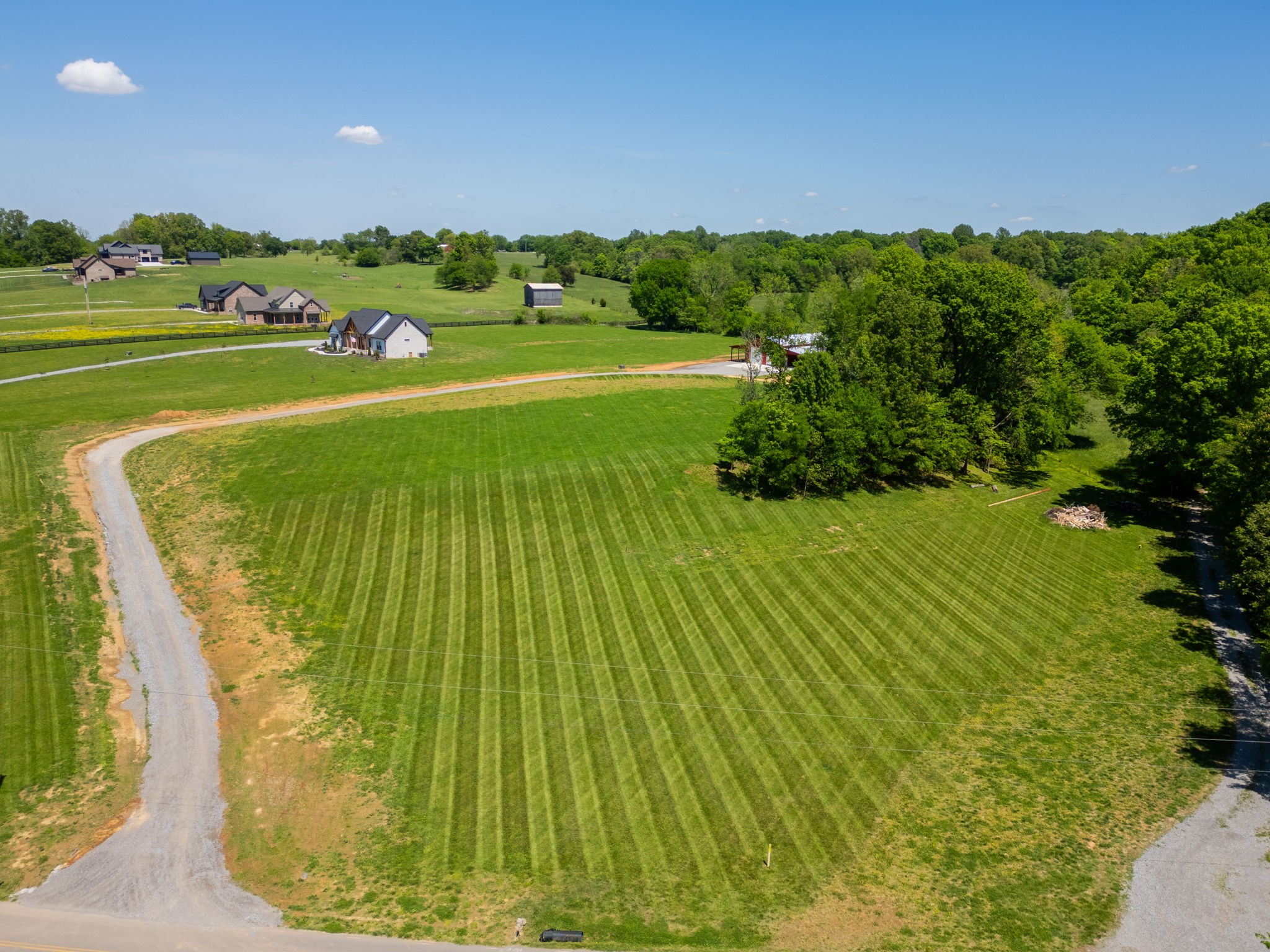 1116 Maxwell Branch Road Cottontown, TN 37048 - Photo 5 of 57 This tract of land offers 5.01 beautiful acres, Creek, Pole Barn, and Utilities. Get a jump start on building your dream Home as much of the work has been done for you.