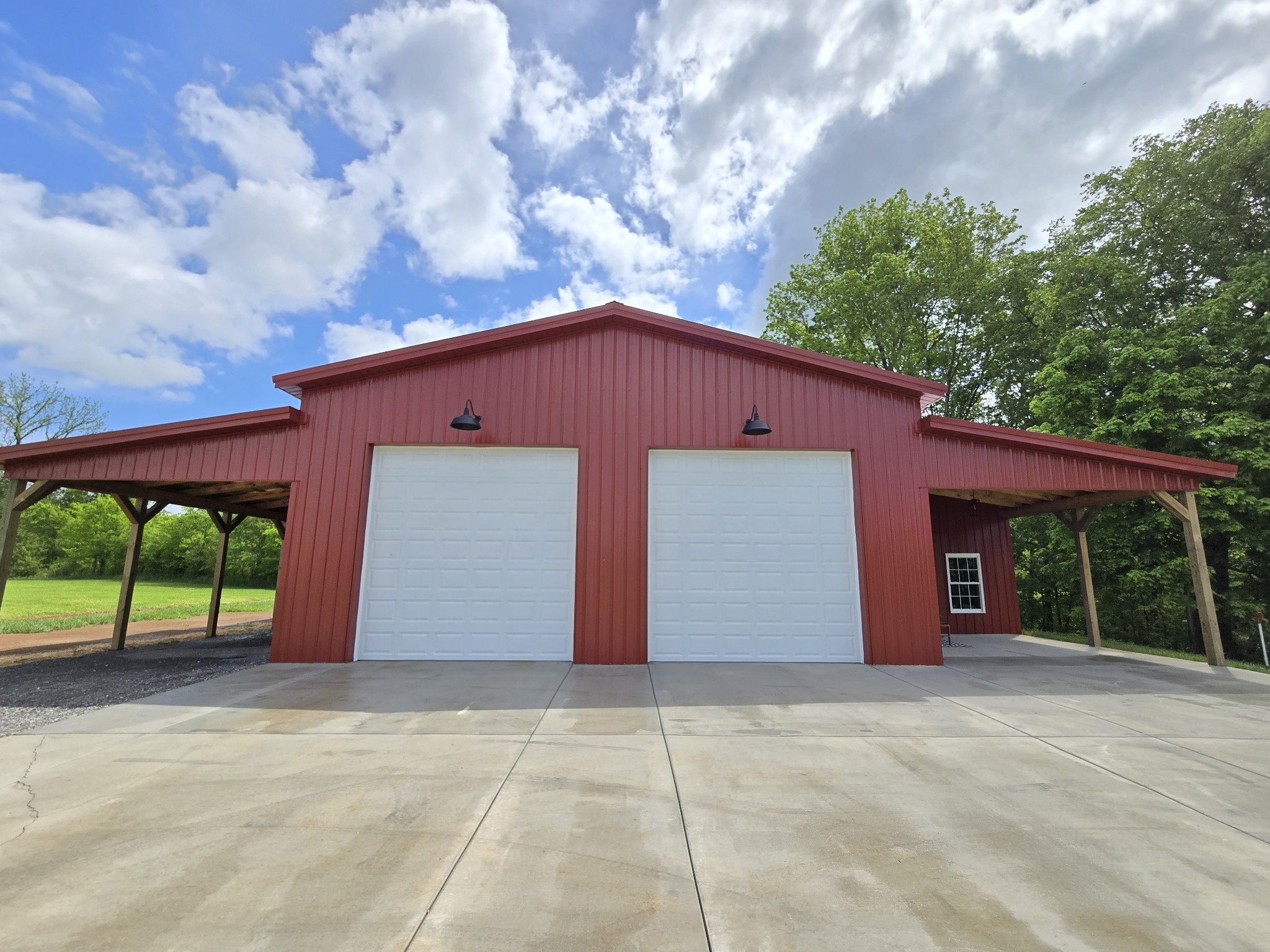 1116 Maxwell Branch Road Cottontown, TN 37048 - Photo 7 of 57 a house with yard in front of it