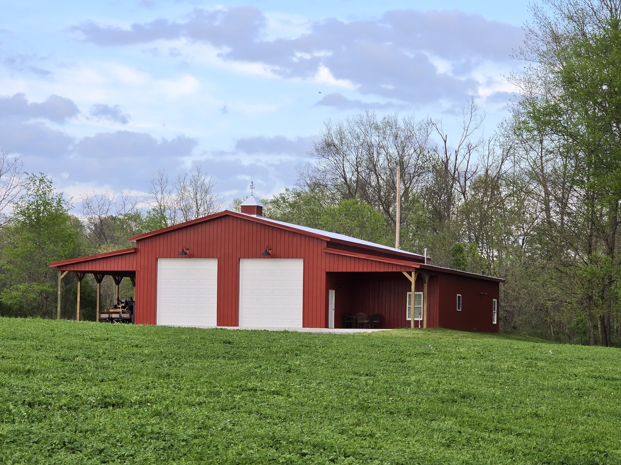 1116 Maxwell Branch Road Cottontown, TN 37048 - Photo 10 of 57 a view of a house with backyard and garden