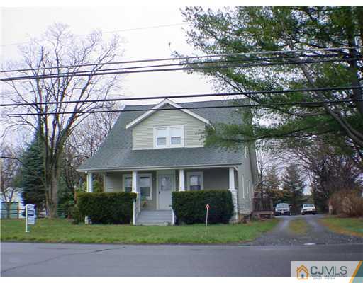 346 Ridge Road Dayton, NJ 08810 - Photo 12 of 12 a front view of a house with a yard