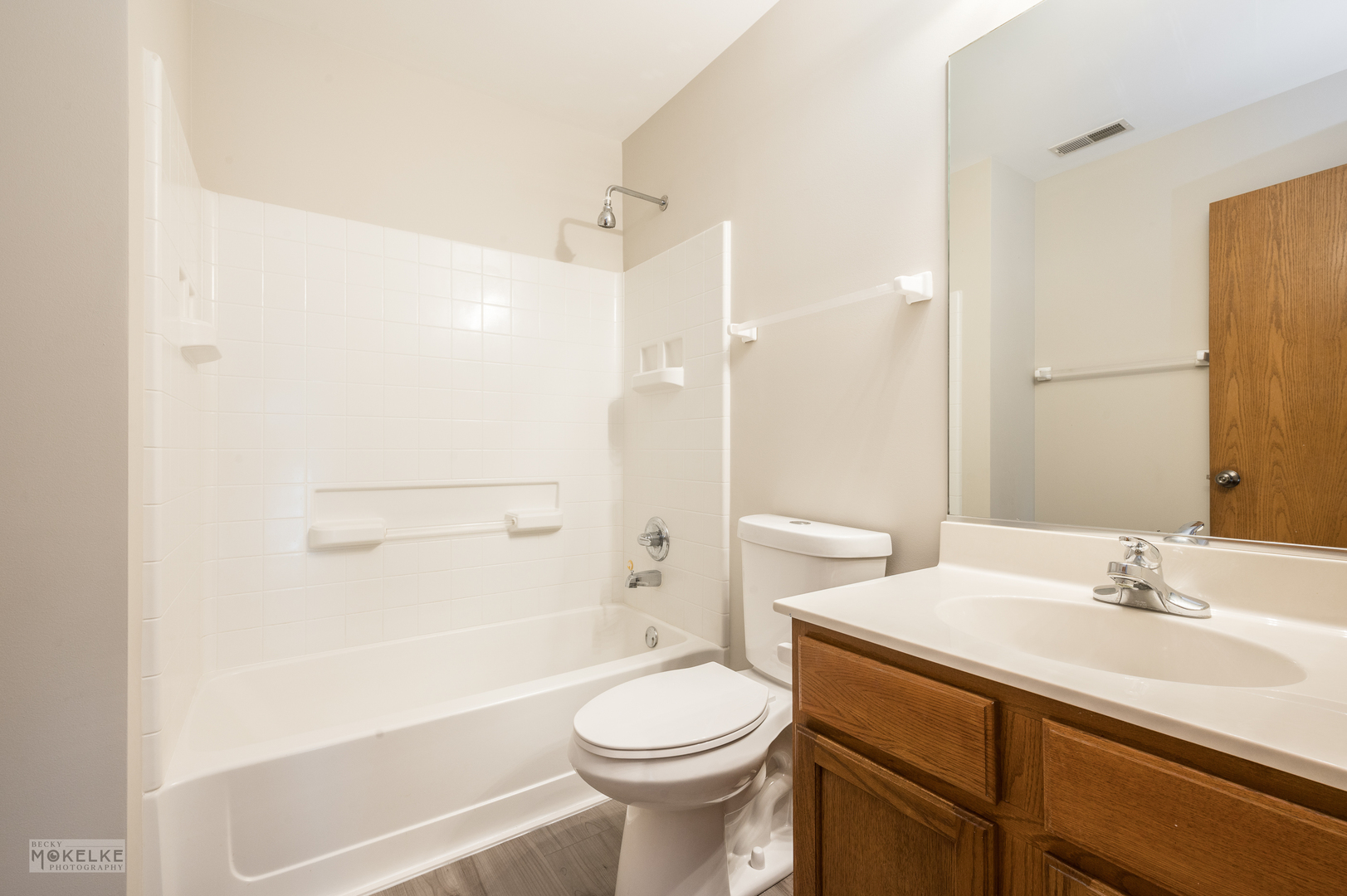 4401 Cummins Street Plano, IL 60545 - Photo 17 of 22 a bathroom with a sink a toilet and shower