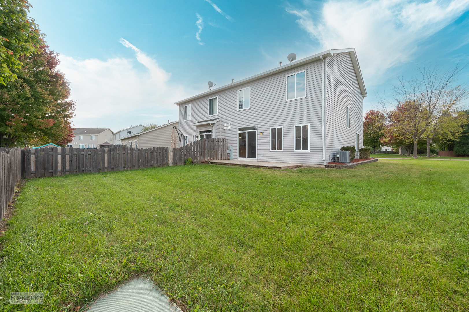 4401 Cummins Street Plano, IL 60545 - Photo 2 of 22 a view of a house with a yard and sitting area