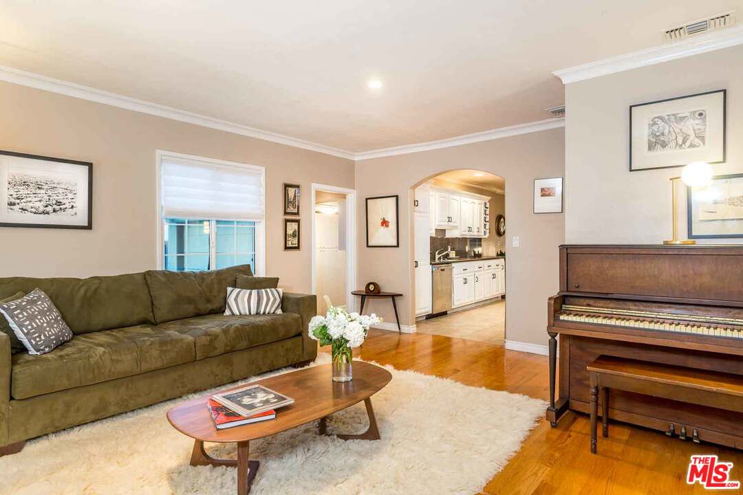 7418 Midfield Avenue Los Angeles, CA 90045 - Photo 2 of 28 a living room with furniture and a piano