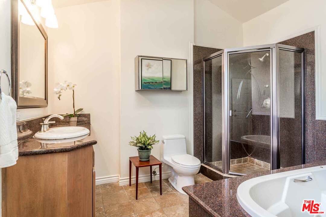 7418 Midfield Avenue Los Angeles, CA 90045 - Photo 9 of 28 a bathroom with a sink toilet and shower