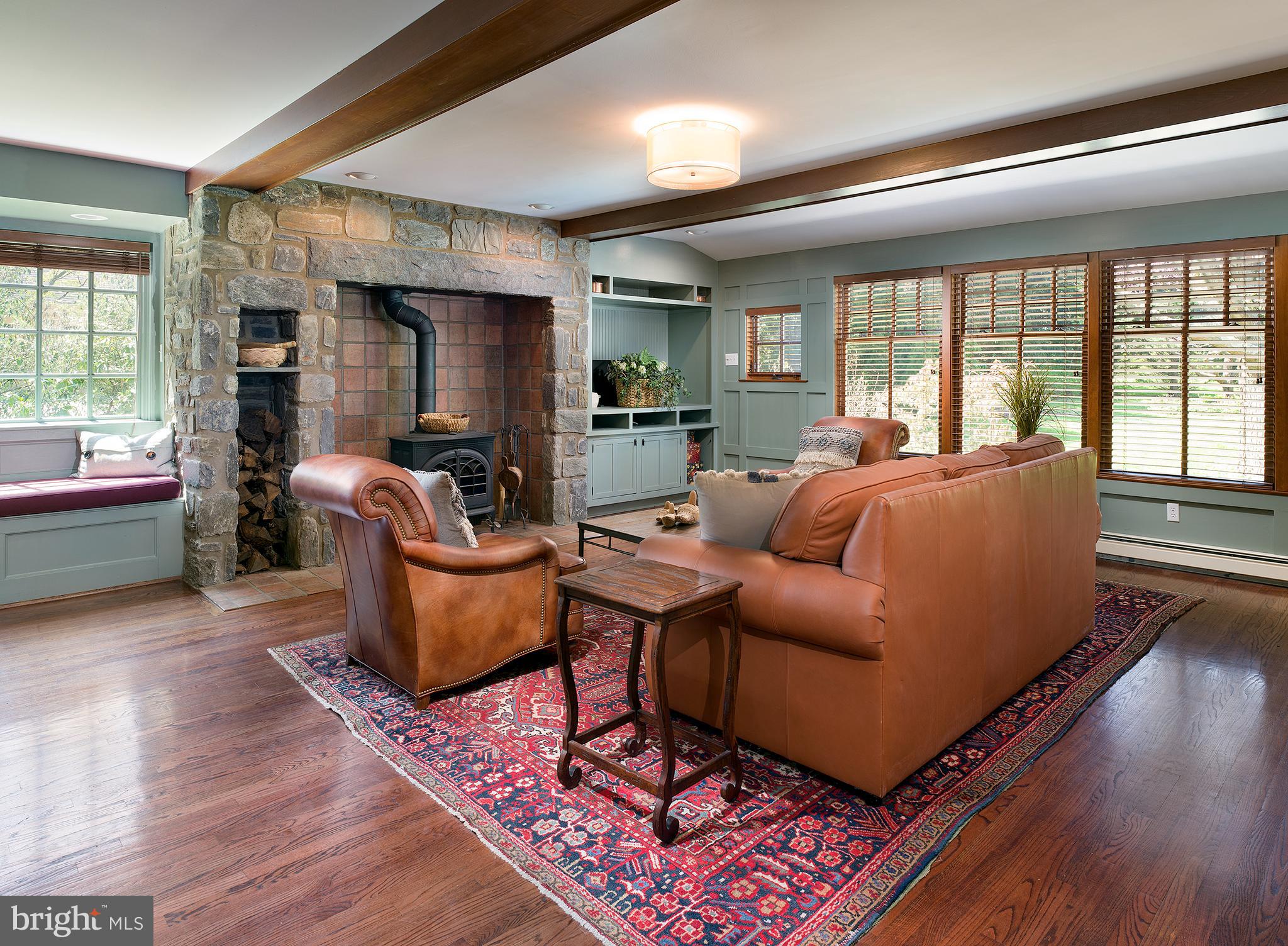512 Atterbury Road Villanova, PA 19085 - Photo 9 of 31 Family Room with Fireplace and Built-ins