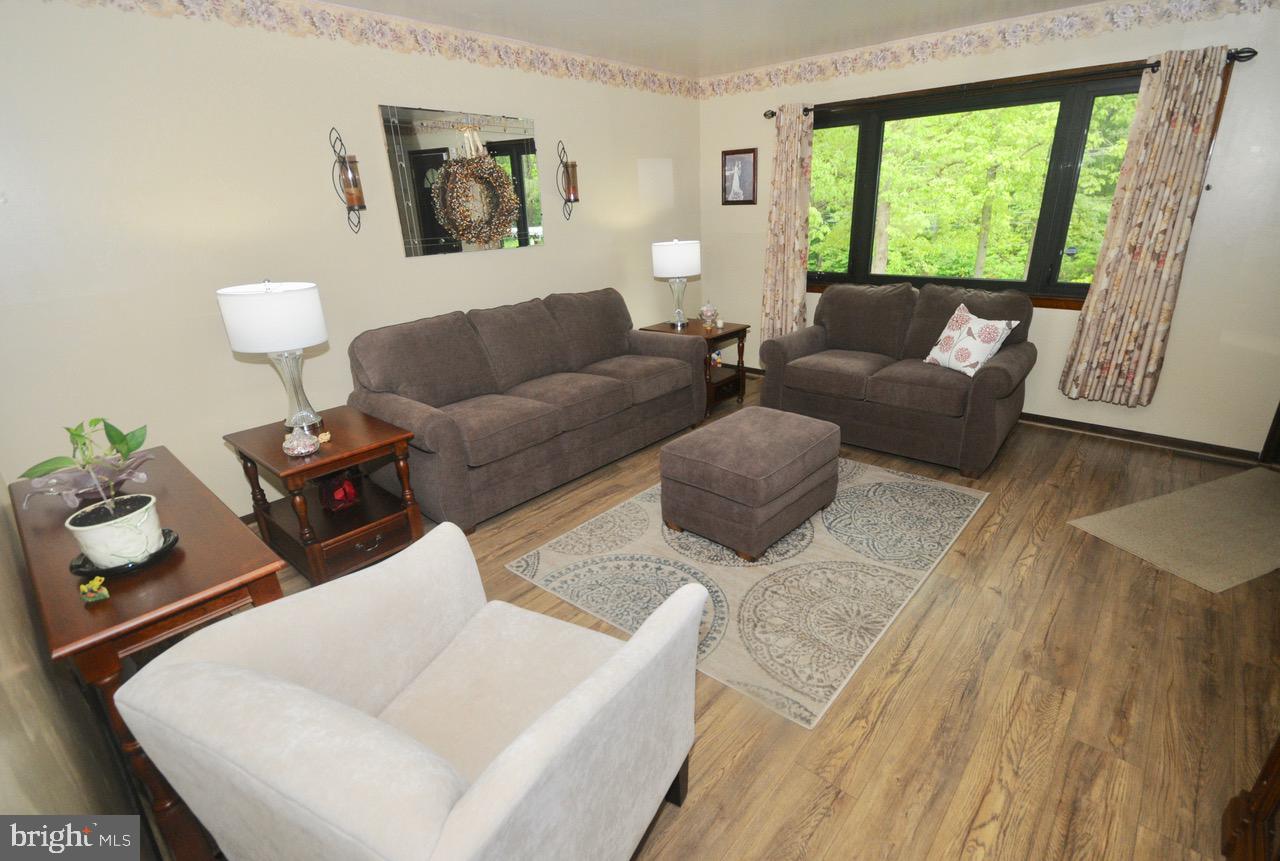2615 County House Road Deptford, NJ 08096 - Photo 4 of 22 Living Room with new flooring