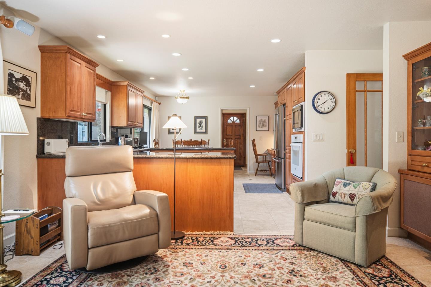 2911 Colton Road Pebble Beach, CA 93953 - Photo 15 of 46 a living room with furniture and a view of kitchen