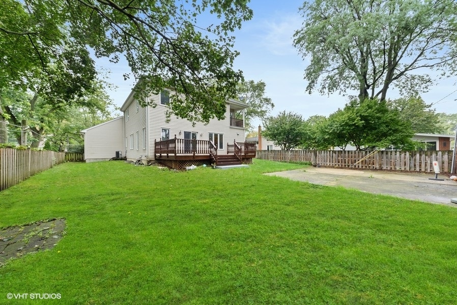 411 South Wilke Road Arlington Heights, IL 60005 - Photo 25 of 29 a view of a house with backyard and sitting area