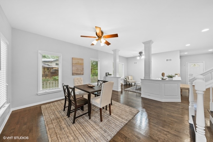 411 South Wilke Road Arlington Heights, IL 60005 - Photo 9 of 29 a view of a dining room with furniture and wooden floor