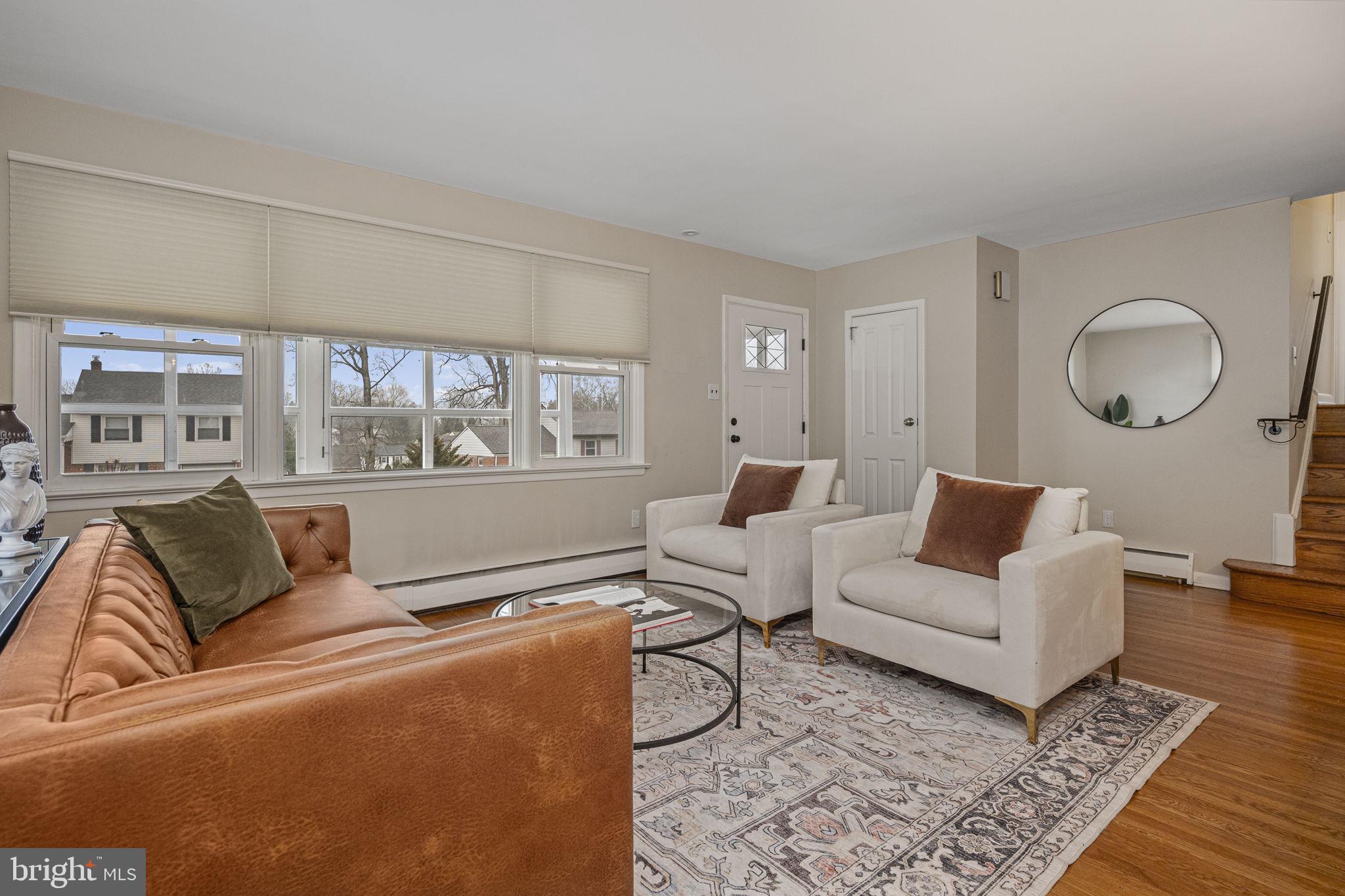 711 Elgin Road Newtown Square, PA 19073 - Photo 5 of 36 Spacious living room with hardwoods