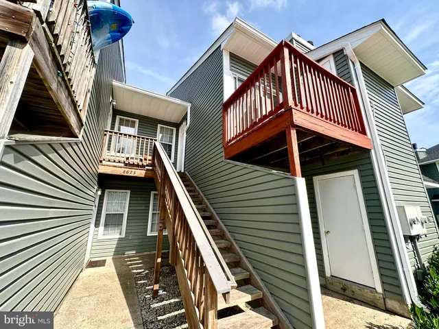 a view of a house with a door and a window
