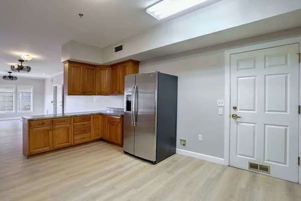 a view of an empty room with a window