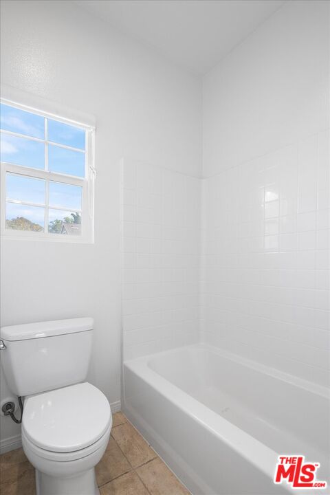 5 Sachem Way Ladera Ranch, CA 92694 - Photo 3 of 37 a white toilet sitting next to a bath tub