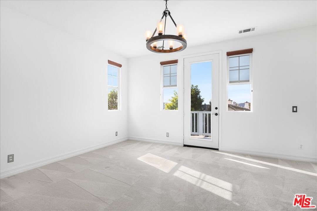 5 Sachem Way Ladera Ranch, CA 92694 - Photo 31 of 37 an empty room with windows