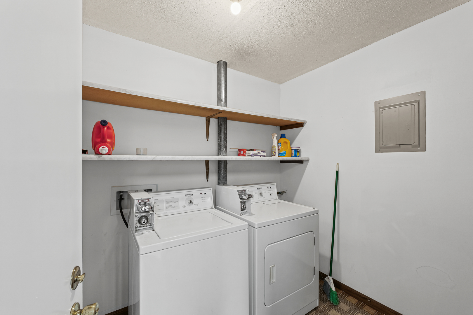 1302 Christopher Circle, Unit 4 Urbana, IL 61802 - Photo 13 of 17 a utility room with dryer and washer