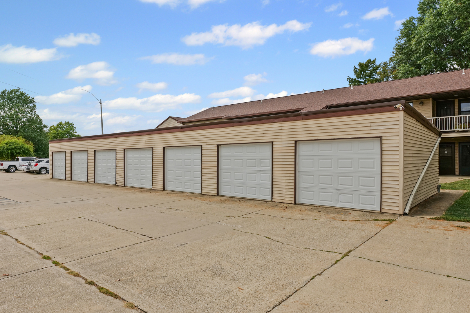 1302 Christopher Circle, Unit 4 Urbana, IL 61802 - Photo 15 of 17 a view of house with garage and large window