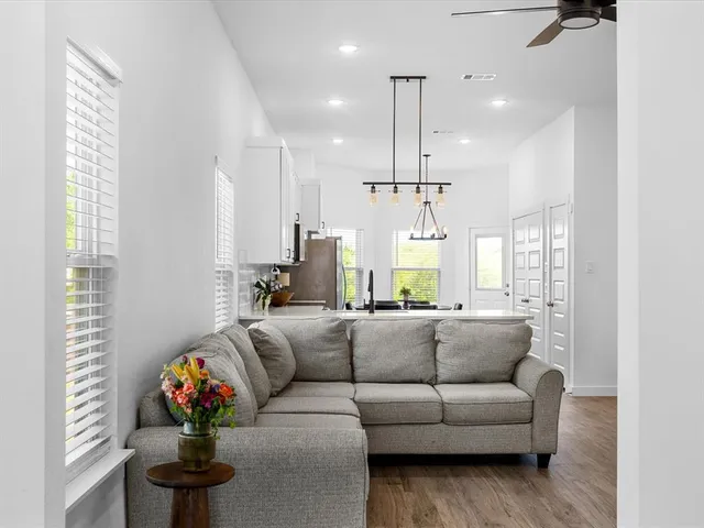 a view of a field with grass and a fence