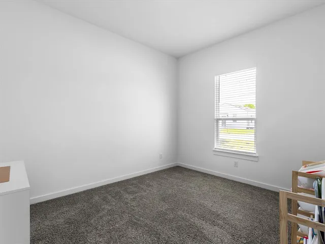 a bedroom with furniture and a couch