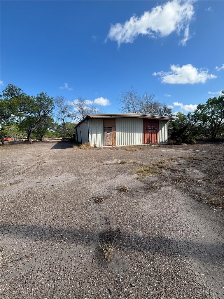 369 Edith Drive Alice, TX 78332 - Photo 23 of 27 a view of yellow house with a yard