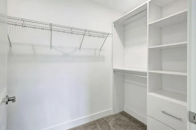 a bathroom with a double vanity sink mirror and