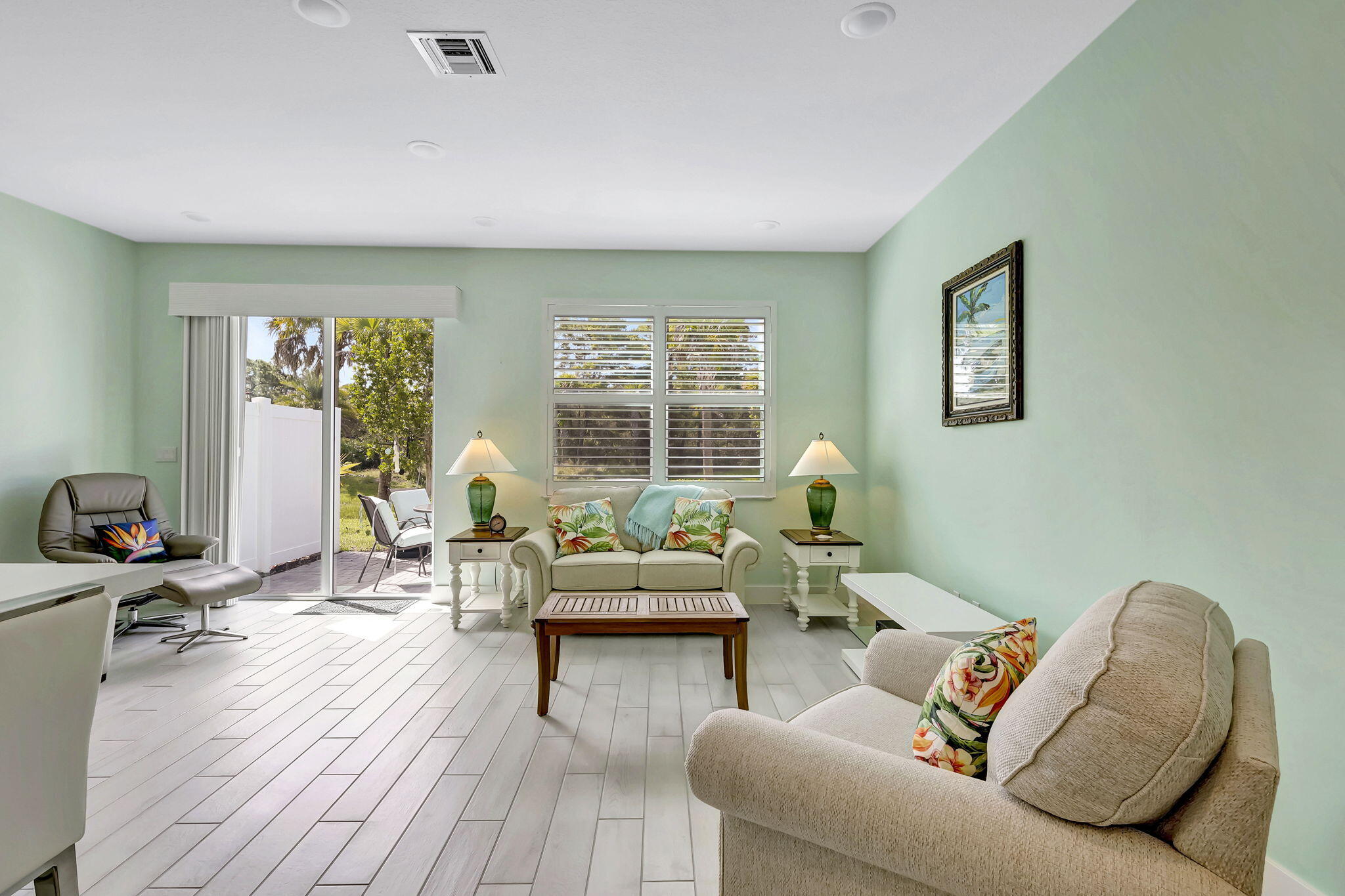 1404 Gopher Terrace Stuart, FL 34994 - Photo 6 of 52 a living room with furniture and a wooden floor