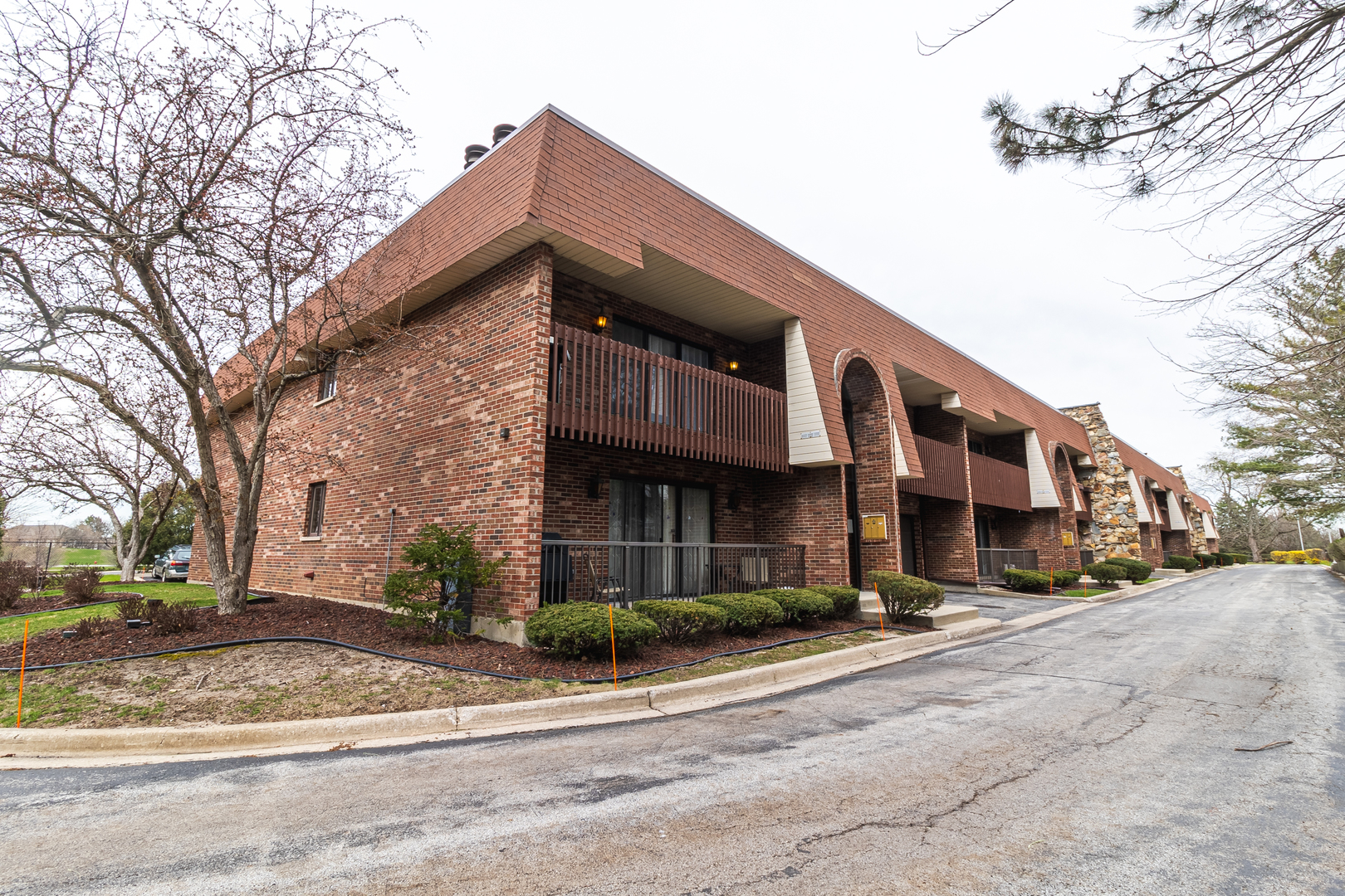 a view of a building with a street