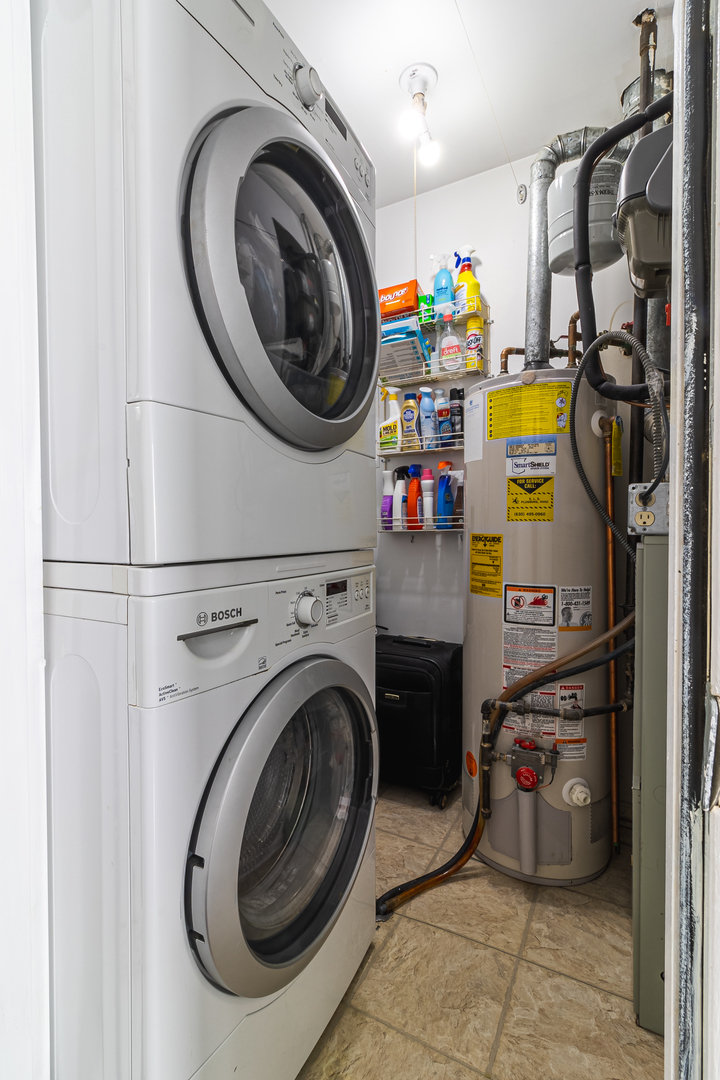 6317 Clarendon Hills Road, Unit 2 Willowbrook, IL 60527 - Photo 16 of 21 a utility room with dryer and washer
