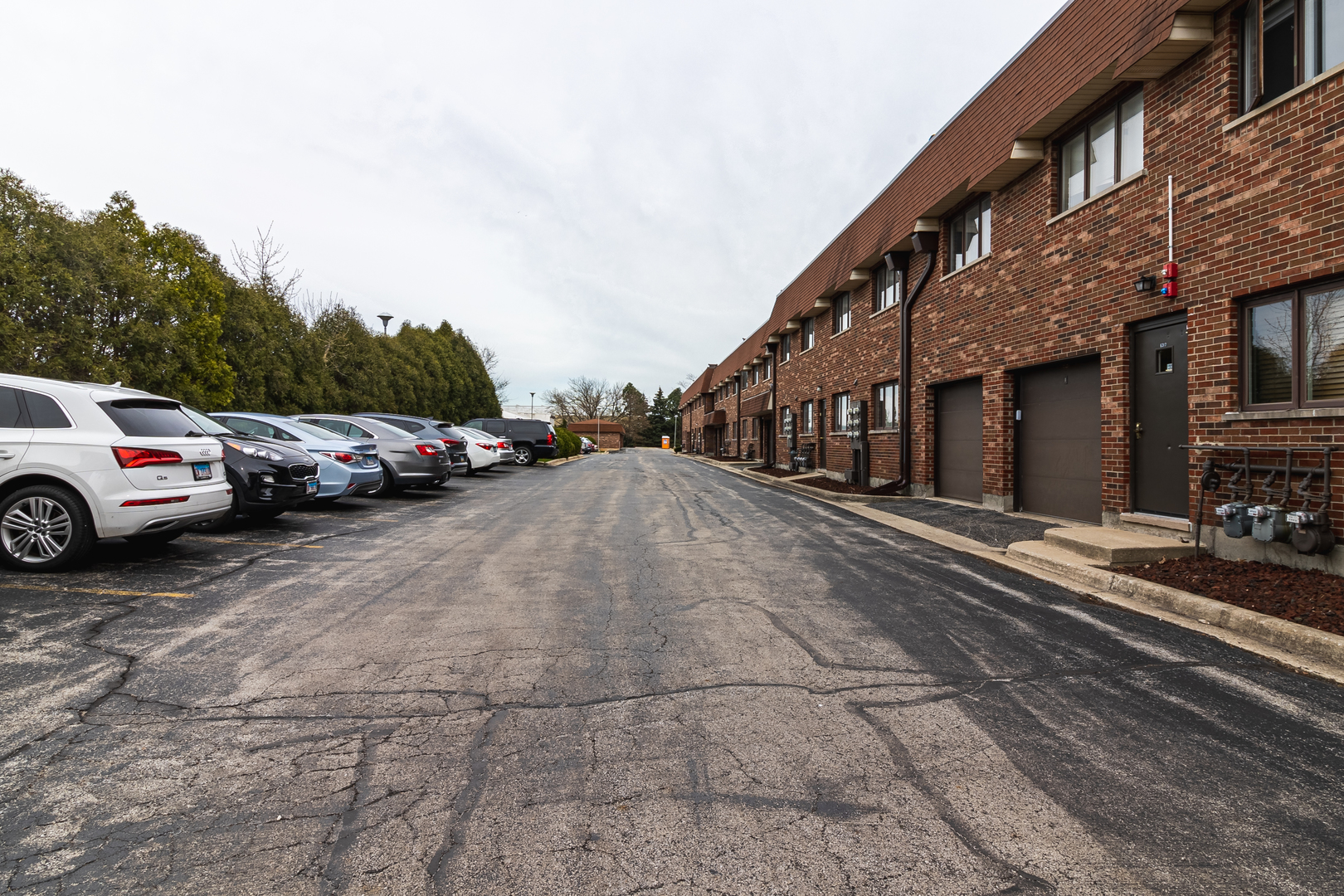 6317 Clarendon Hills Road, Unit 2 Willowbrook, IL 60527 - Photo 19 of 21 a view of a car park in front of a building