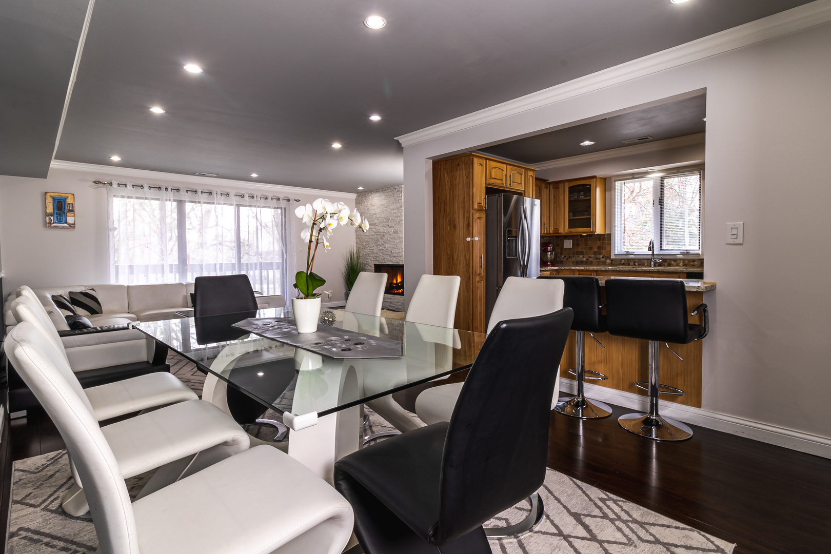 6317 Clarendon Hills Road, Unit 2 Willowbrook, IL 60527 - Photo 4 of 21 a view of a dining room with furniture window and wooden floor