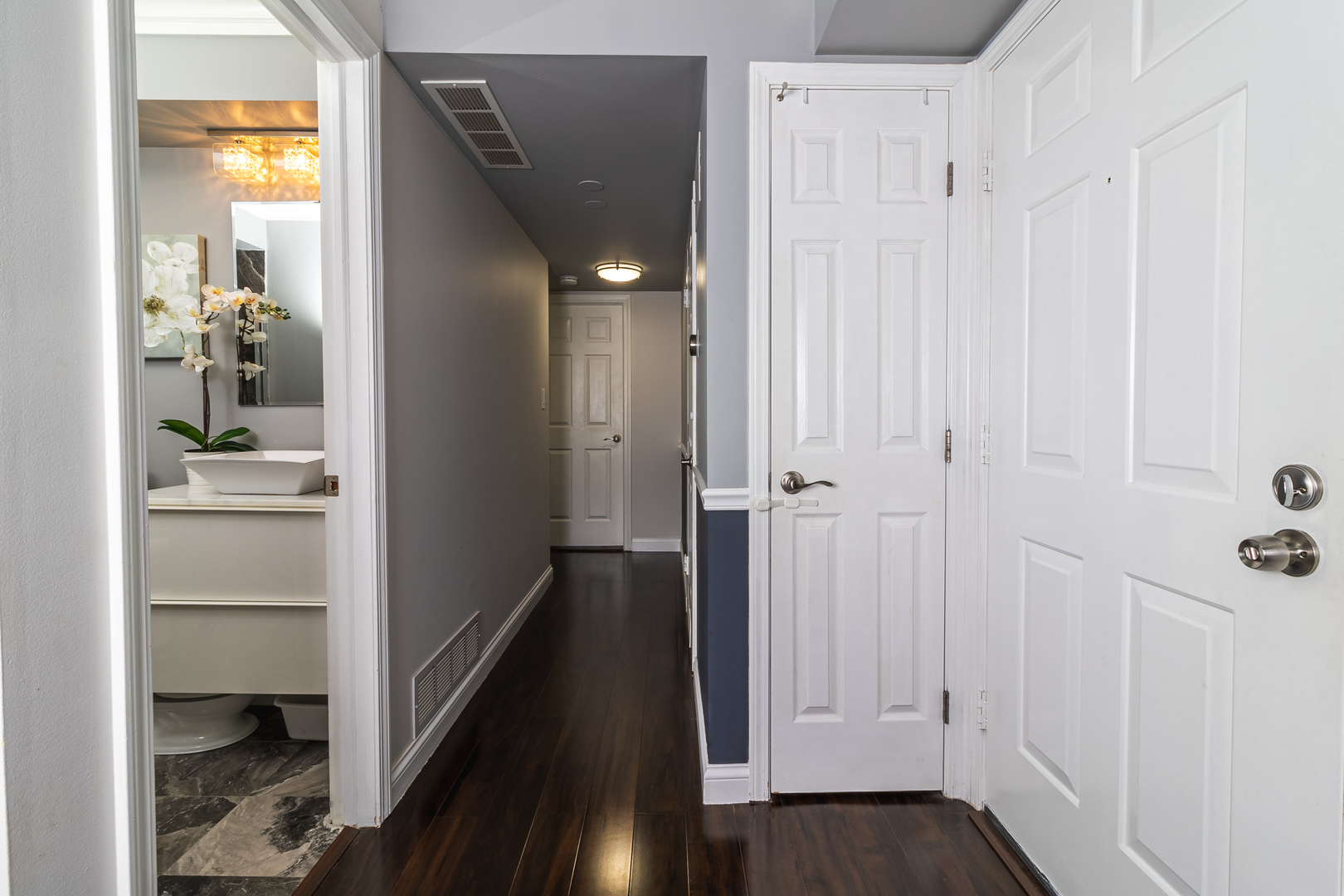 6317 Clarendon Hills Road, Unit 2 Willowbrook, IL 60527 - Photo 7 of 21 a view of a bathroom from the hallway