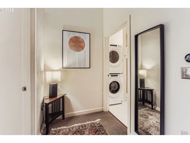 a bathroom with a toilet sink and a mirror
