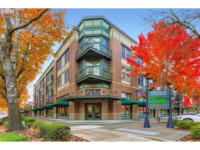 a view of a backyard with sitting area