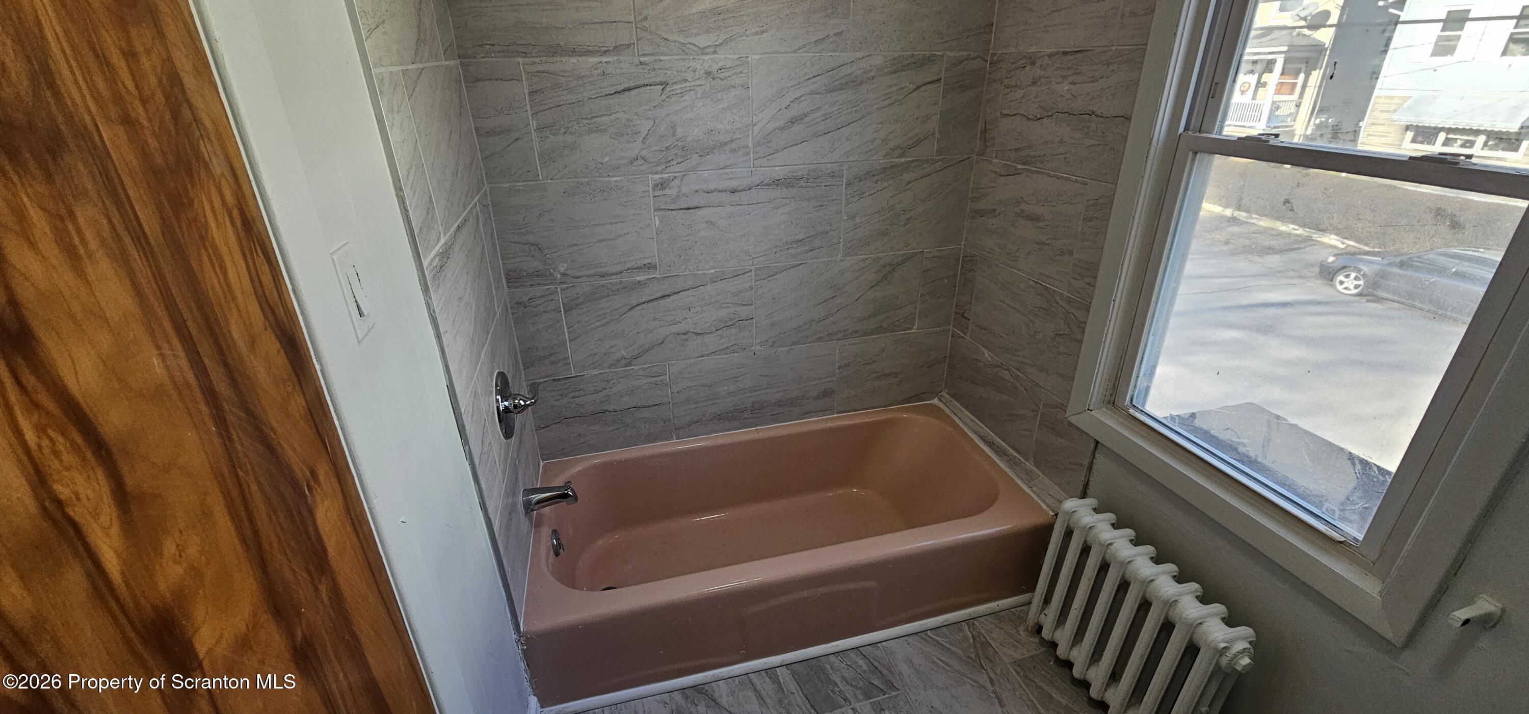 1919 Price Street Scranton, PA 18504 - Photo 12 of 20 a bathroom with a tub