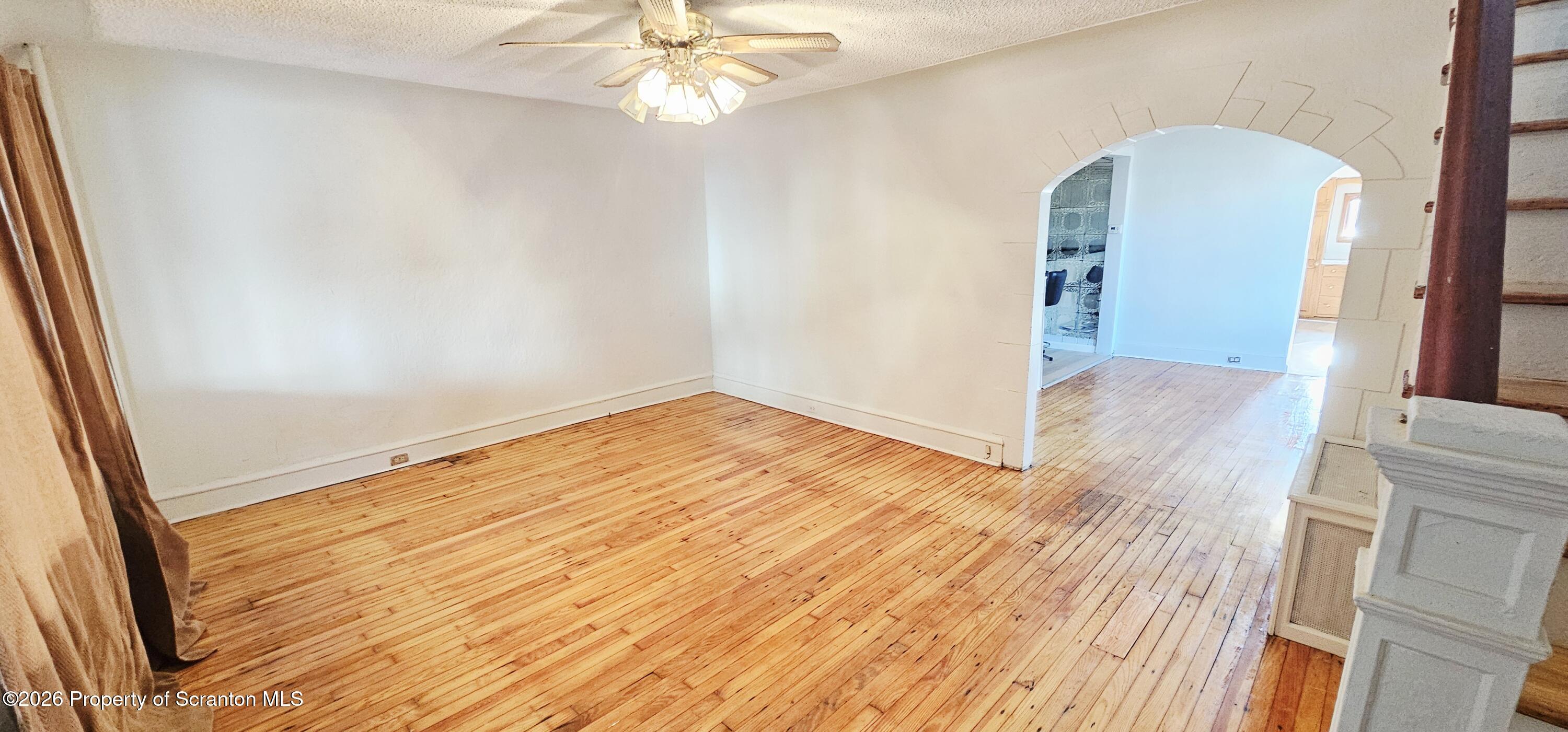 1919 Price Street Scranton, PA 18504 - Photo 3 of 20 a view of empty room with wooden floor