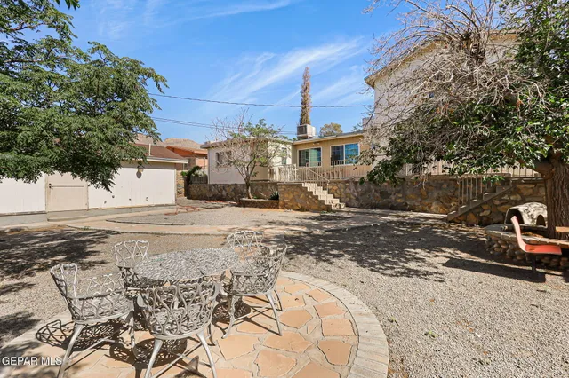 a view of a road with a building in the background