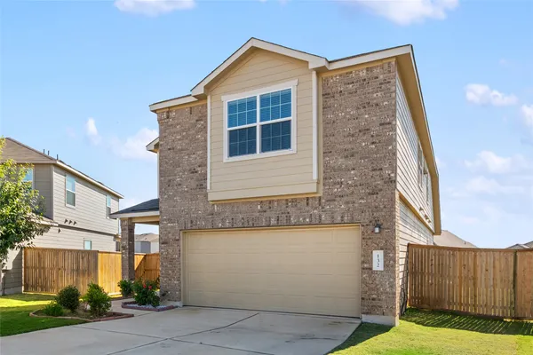 a view of front of house with garage