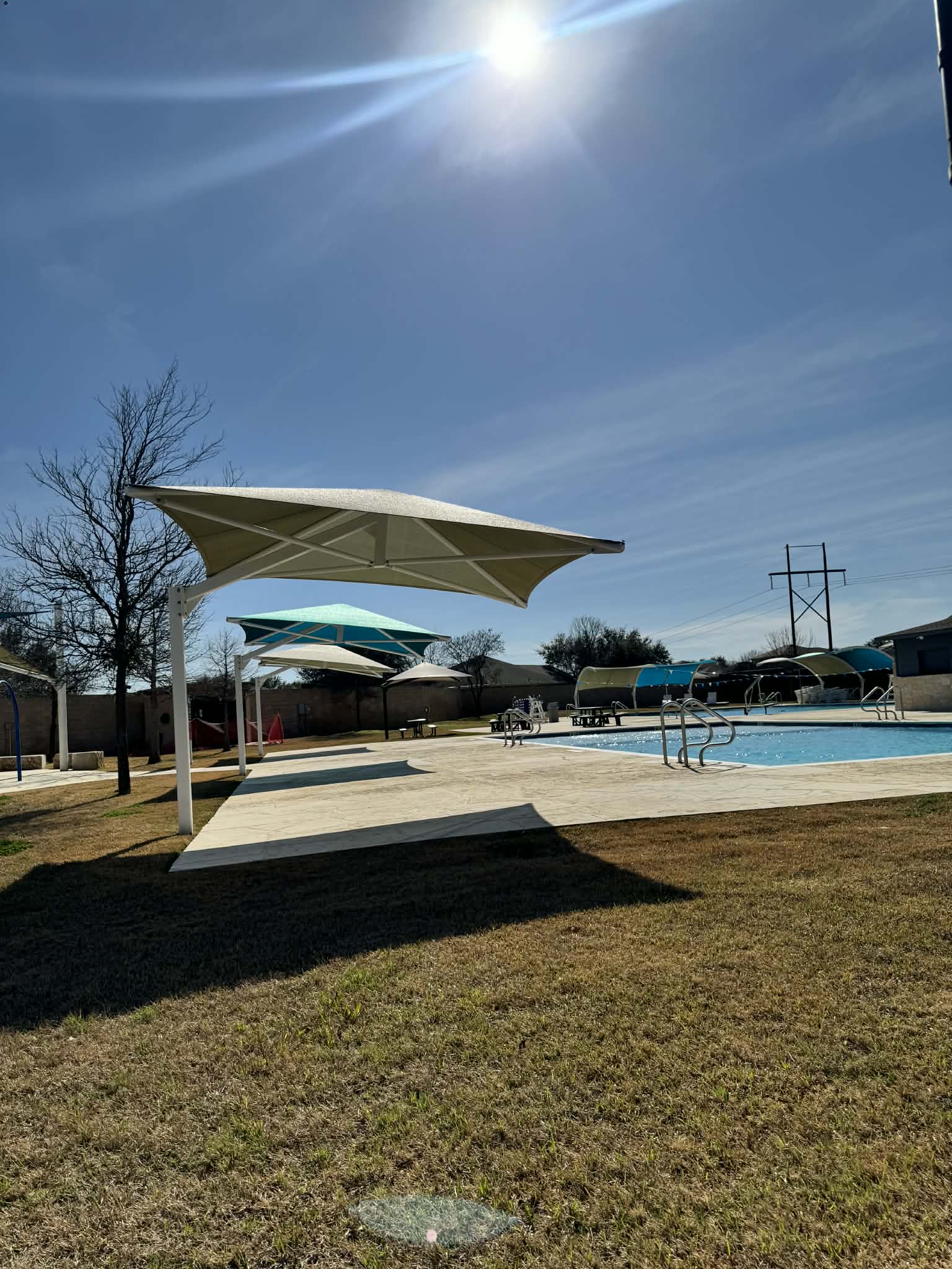 132 Joe Kidd Lane Jarrell, TX 76537 - Photo 36 of 39 a view of swimming pool with outdoor seating and yard in back