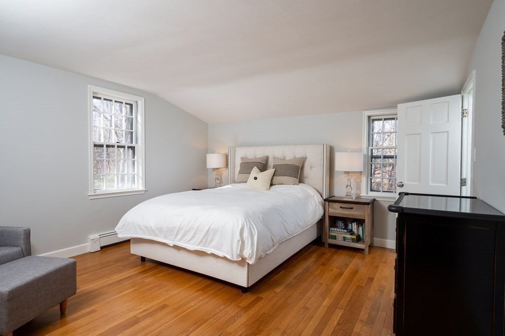 4 King Philip Path Hingham, MA 02043 - Photo 11 of 21 a bedroom with a bed and window
