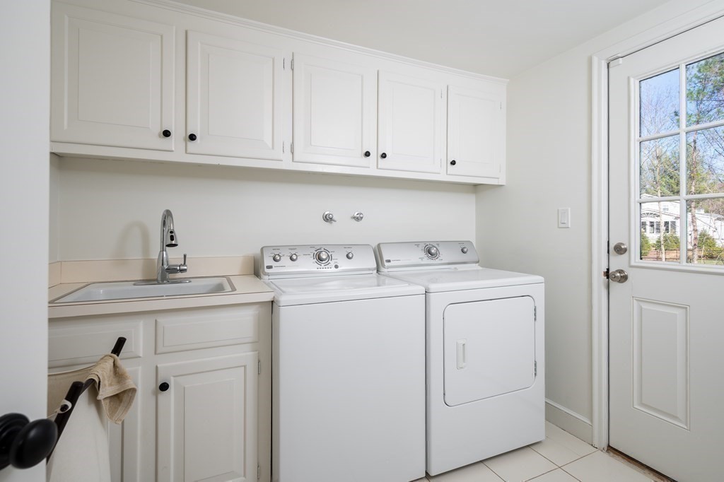 4 King Philip Path Hingham, MA 02043 - Photo 15 of 21 a utility room with dryer and washer