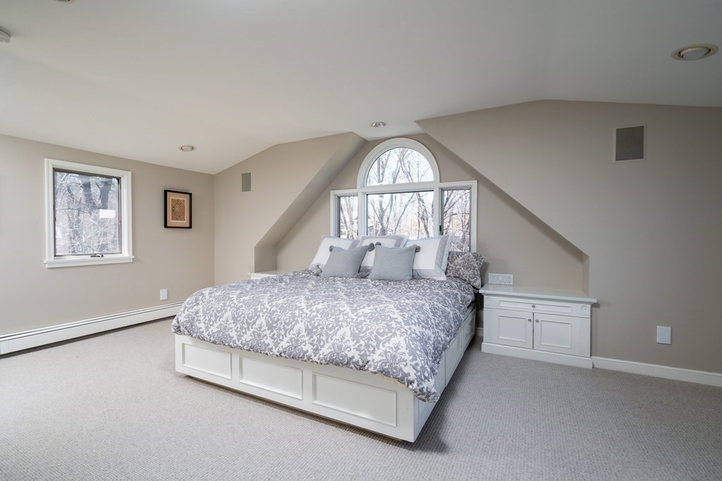 4 King Philip Path Hingham, MA 02043 - Photo 8 of 21 a bedroom with a bed and a window
