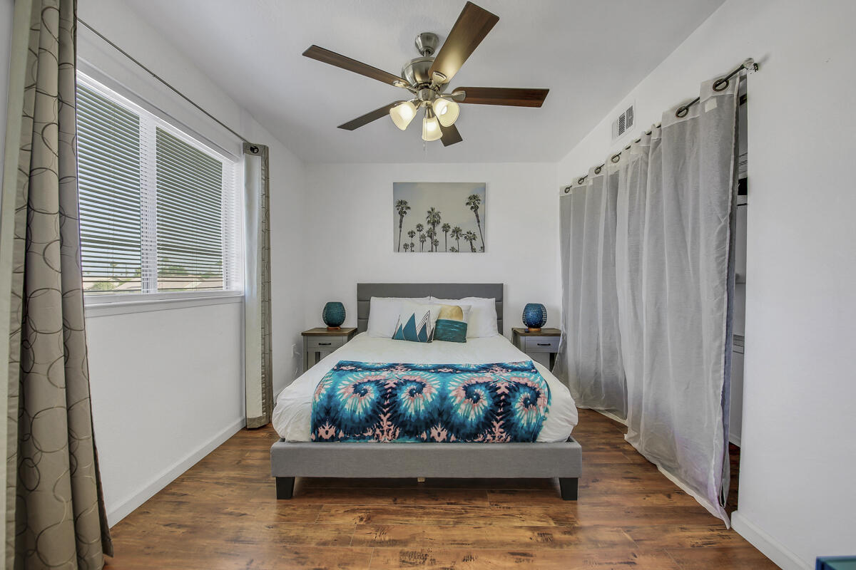 45640 Cimarron Road Indio, CA 92201 - Photo 15 of 25 a bedroom with bed and a window