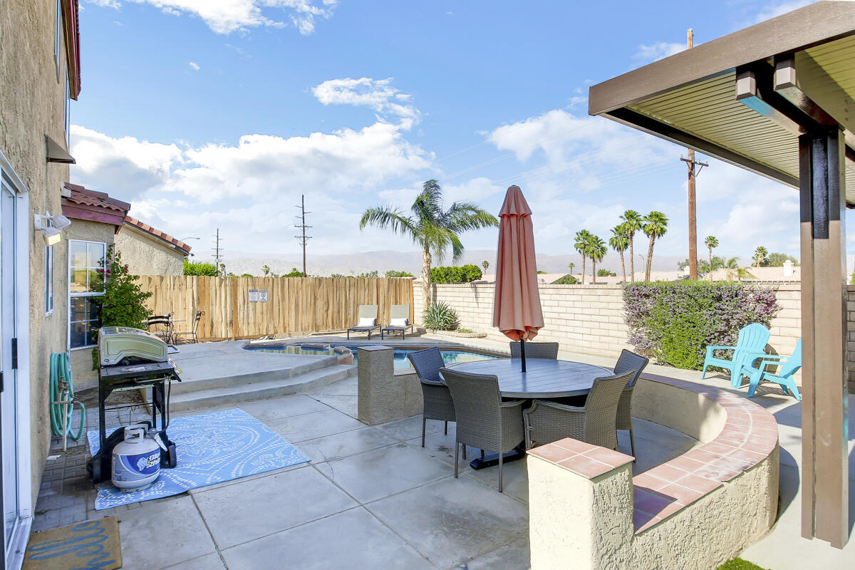 45640 Cimarron Road Indio, CA 92201 - Photo 25 of 25 a building outdoor space with patio furniture