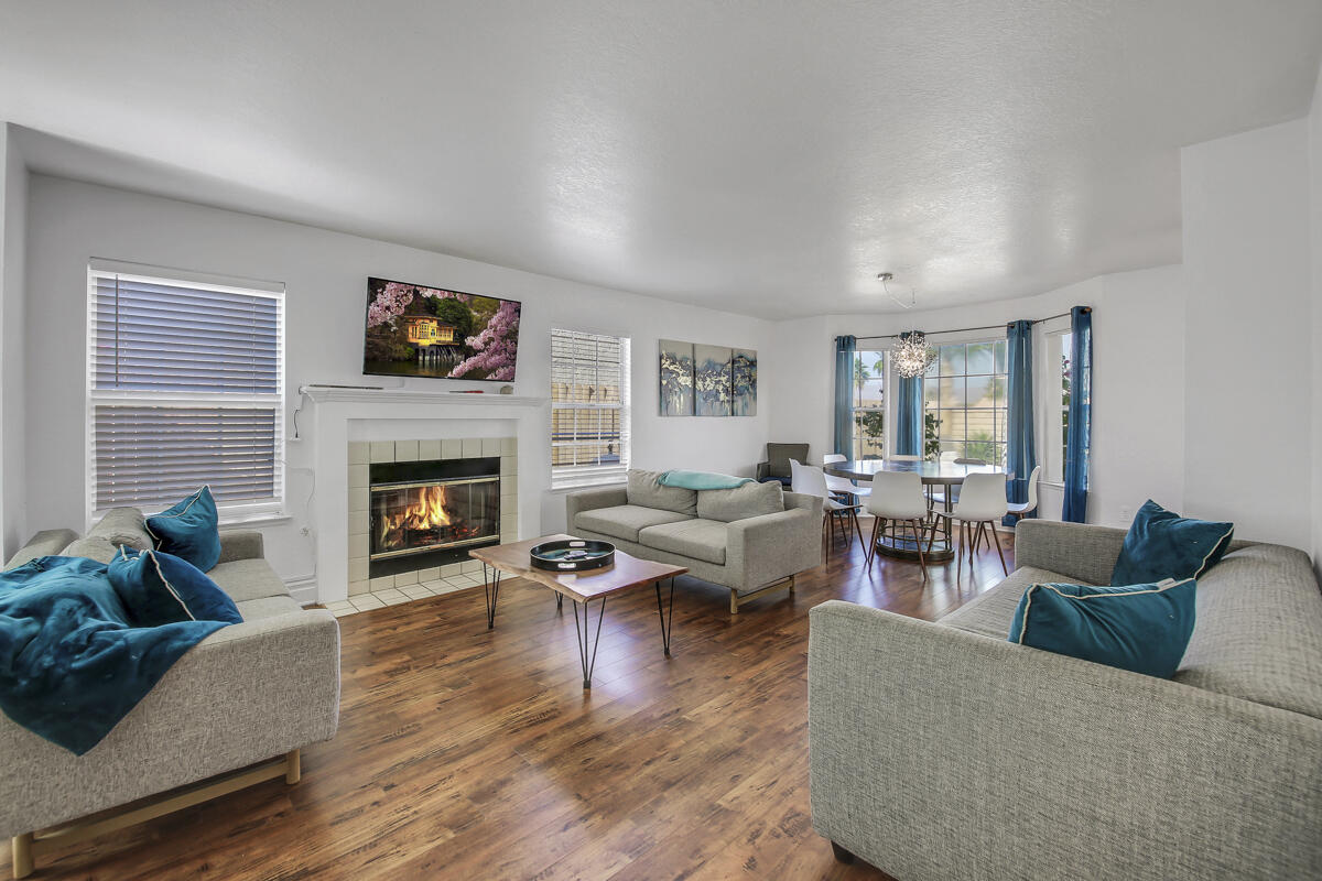 45640 Cimarron Road Indio, CA 92201 - Photo 4 of 25 a living room with furniture and a fireplace