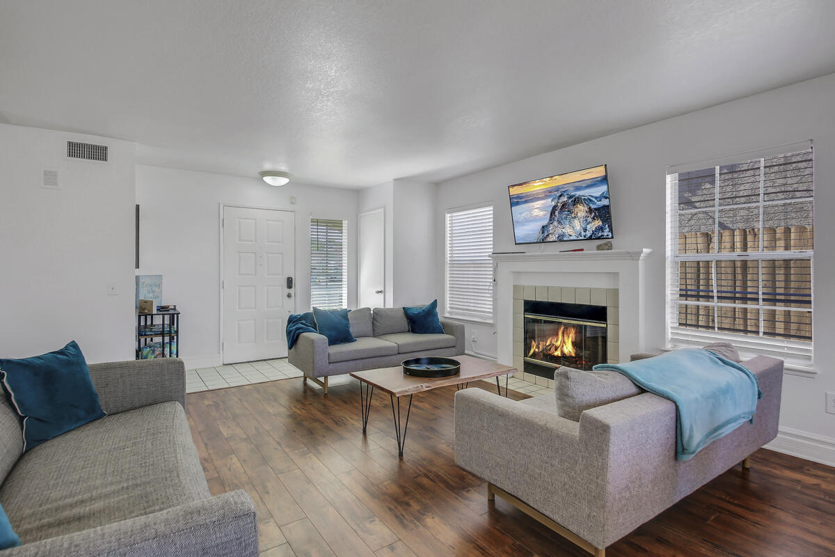 45640 Cimarron Road Indio, CA 92201 - Photo 6 of 25 a living room with furniture and a fireplace
