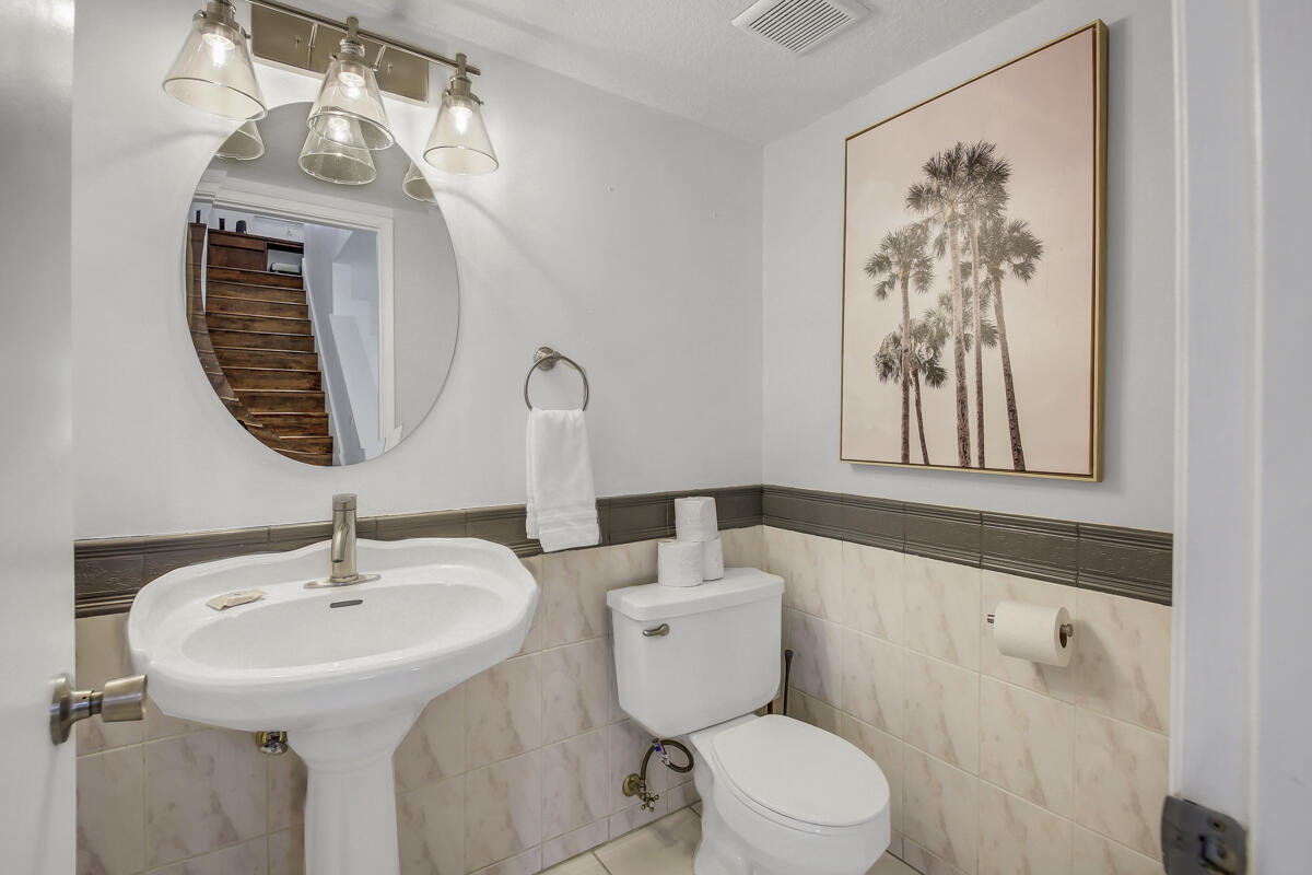 45640 Cimarron Road Indio, CA 92201 - Photo 7 of 25 a bathroom with a toilet sink and mirror