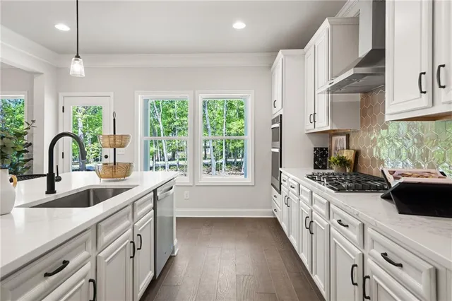 a spacious bedroom with a bed and furniture