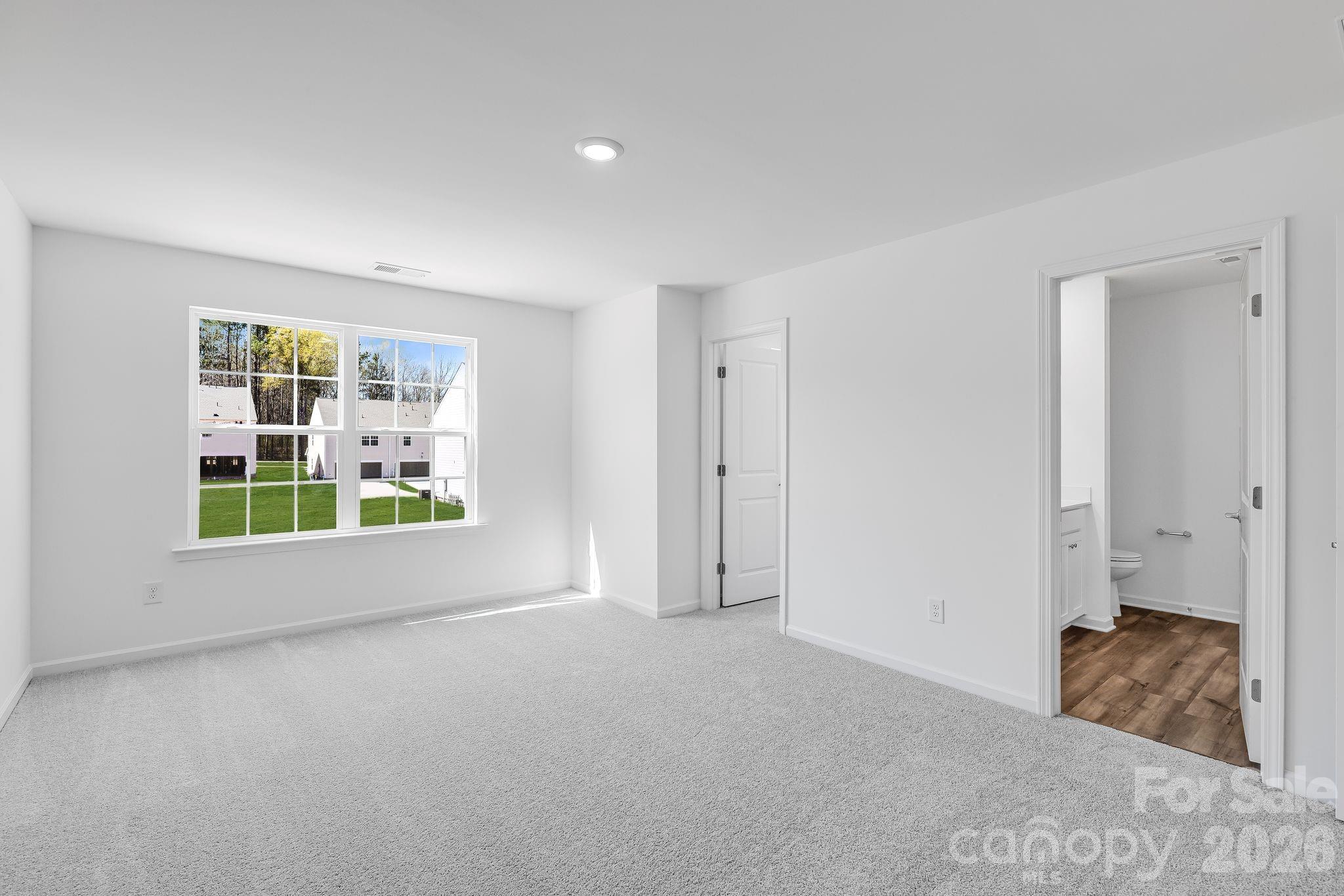 631 Sparano Loop York, SC 29745 - Photo 11 of 15 a view of an empty room with a window