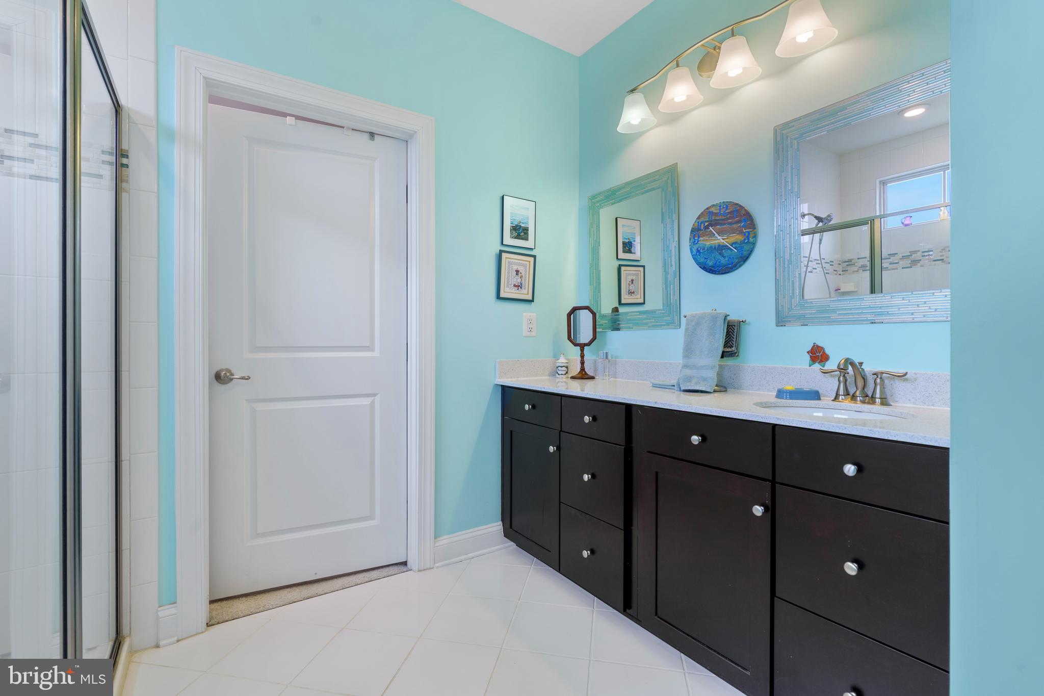 6926 Summit Circle Baltimore, MD 21239 - Photo 20 of 52 a bathroom with a sink and a mirror