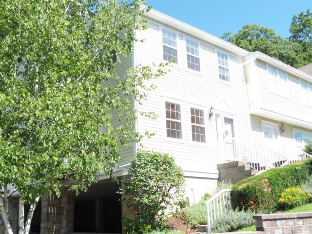 633 Danbury Road, Unit 18 Ridgefield, CT 06877 - Photo 1 of 1 a view of a house with a tree